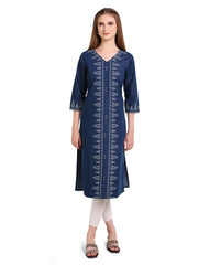 Woman wearing a blue embroidered kurta with white pants on a white background